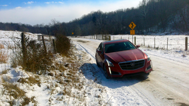 Illustration for article titled Yes, You Can Hoon A $70,000, 420 HP Cadillac On Ice And Snow